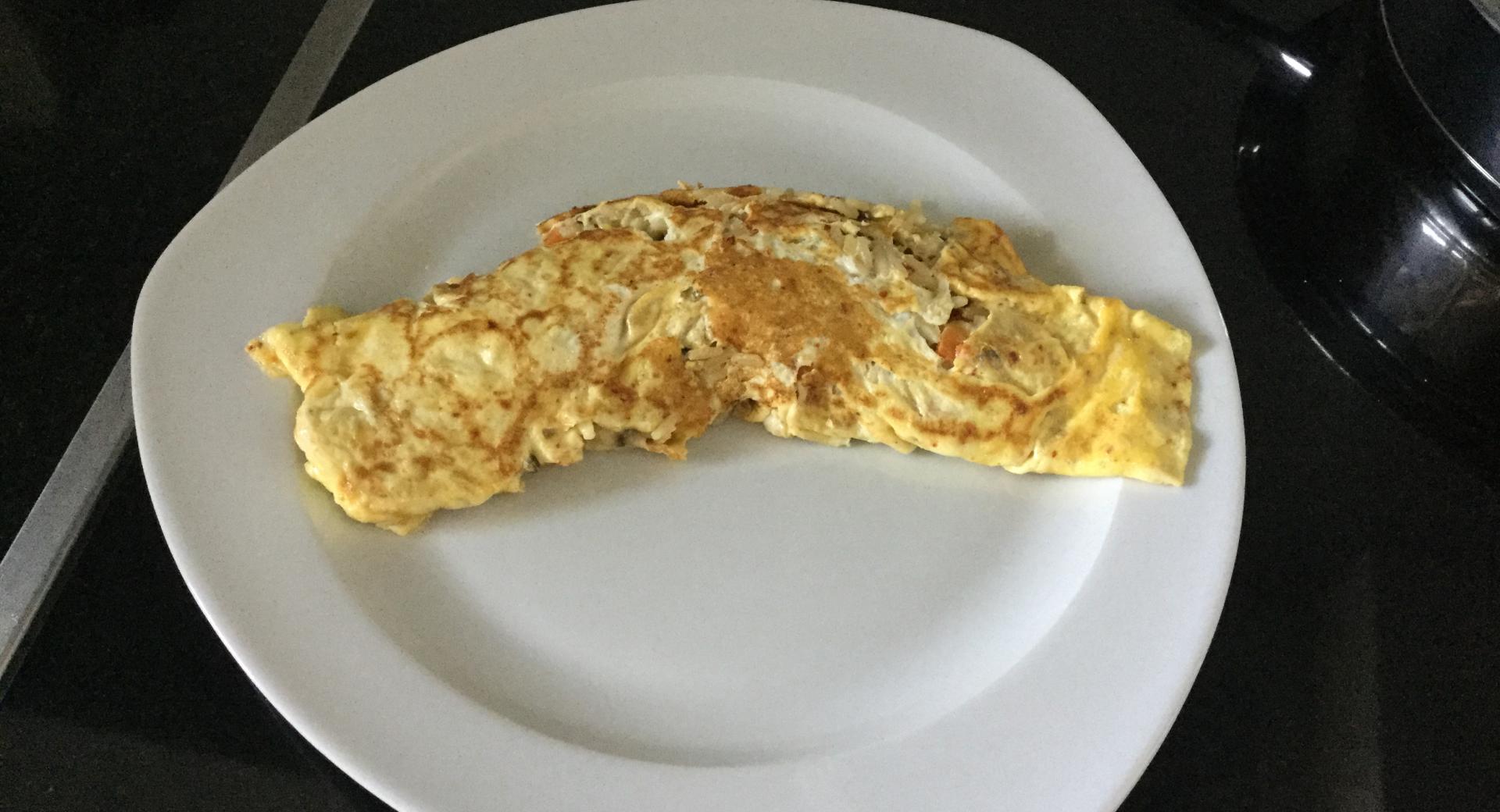 Omelette mit Gemüse-Kräuter-Wildreisfüllung