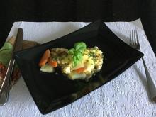 Zanderfilets an Senfkruste auf Wirz-Kartoffelgemüse